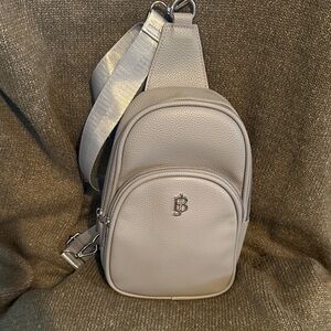 Grey Sling backpack